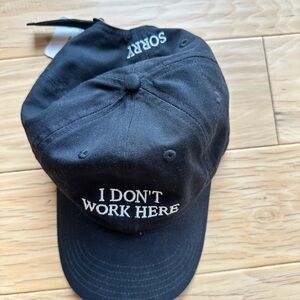 Black Adjustable Hat with “Sorry” “I Don’t Work Here” White Embroidery